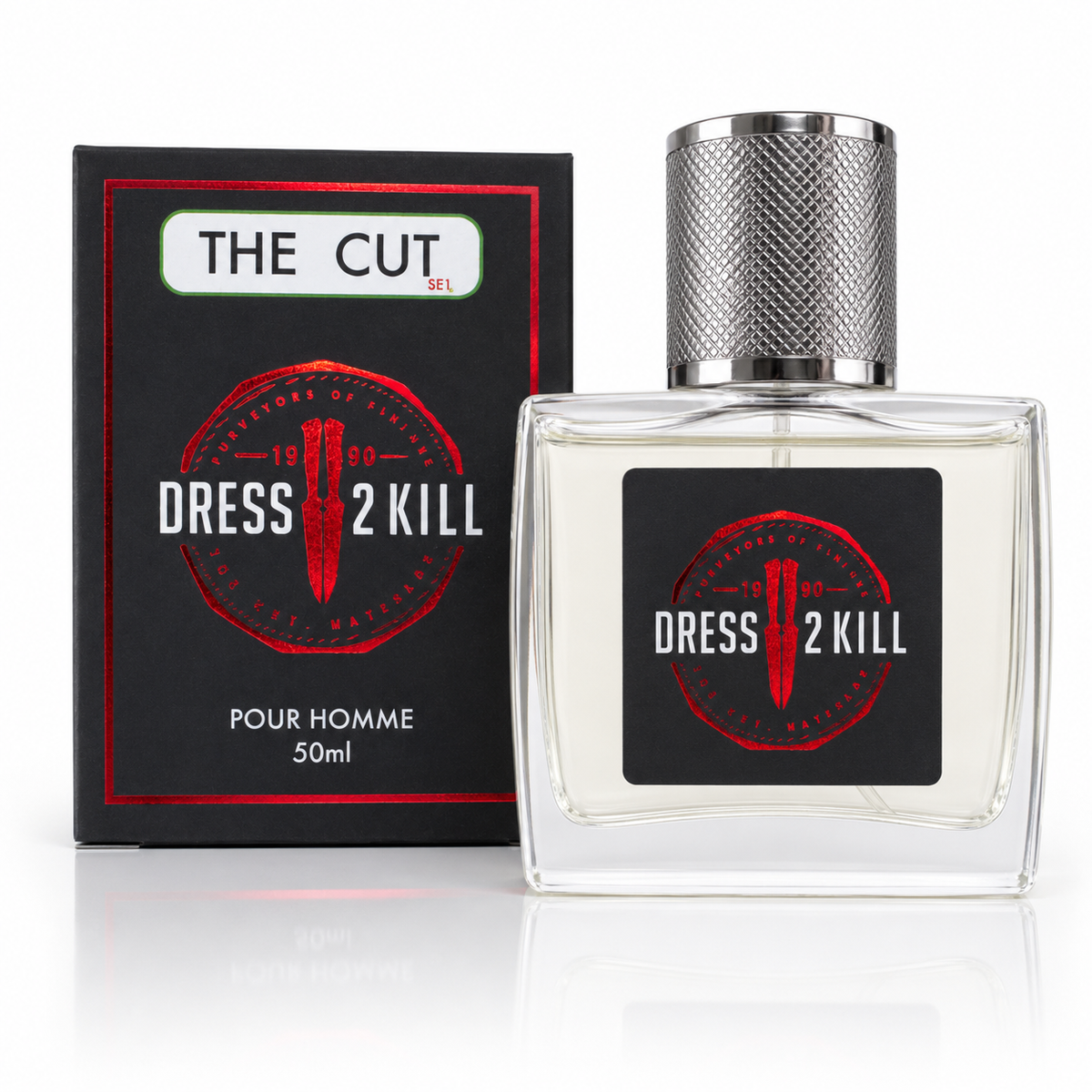 A 50ml bottle of Dress 2 Kill 'The Cut' perfume for men, shown next to its black packaging box with red and white graphics on a reflective white background.